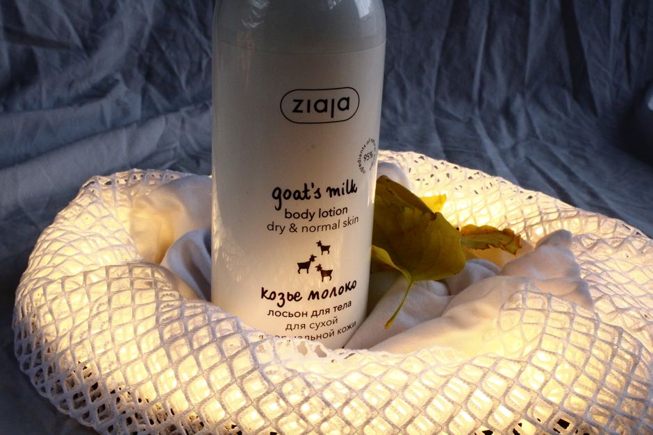 Studio shot of Ziaja goat's milk body lotion with cozy lighting.